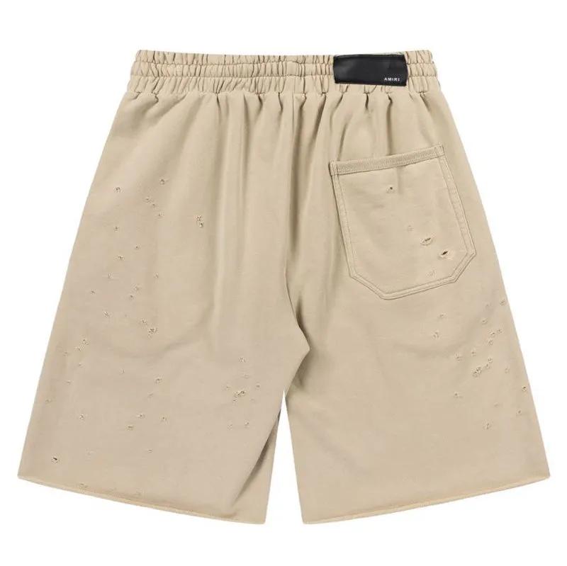 AMIRI logo-embellished cotton track Shorts