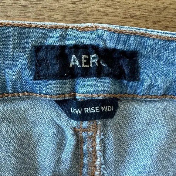 Distressed Low Rise Midi Jean Shorts w/Cuffed Hems