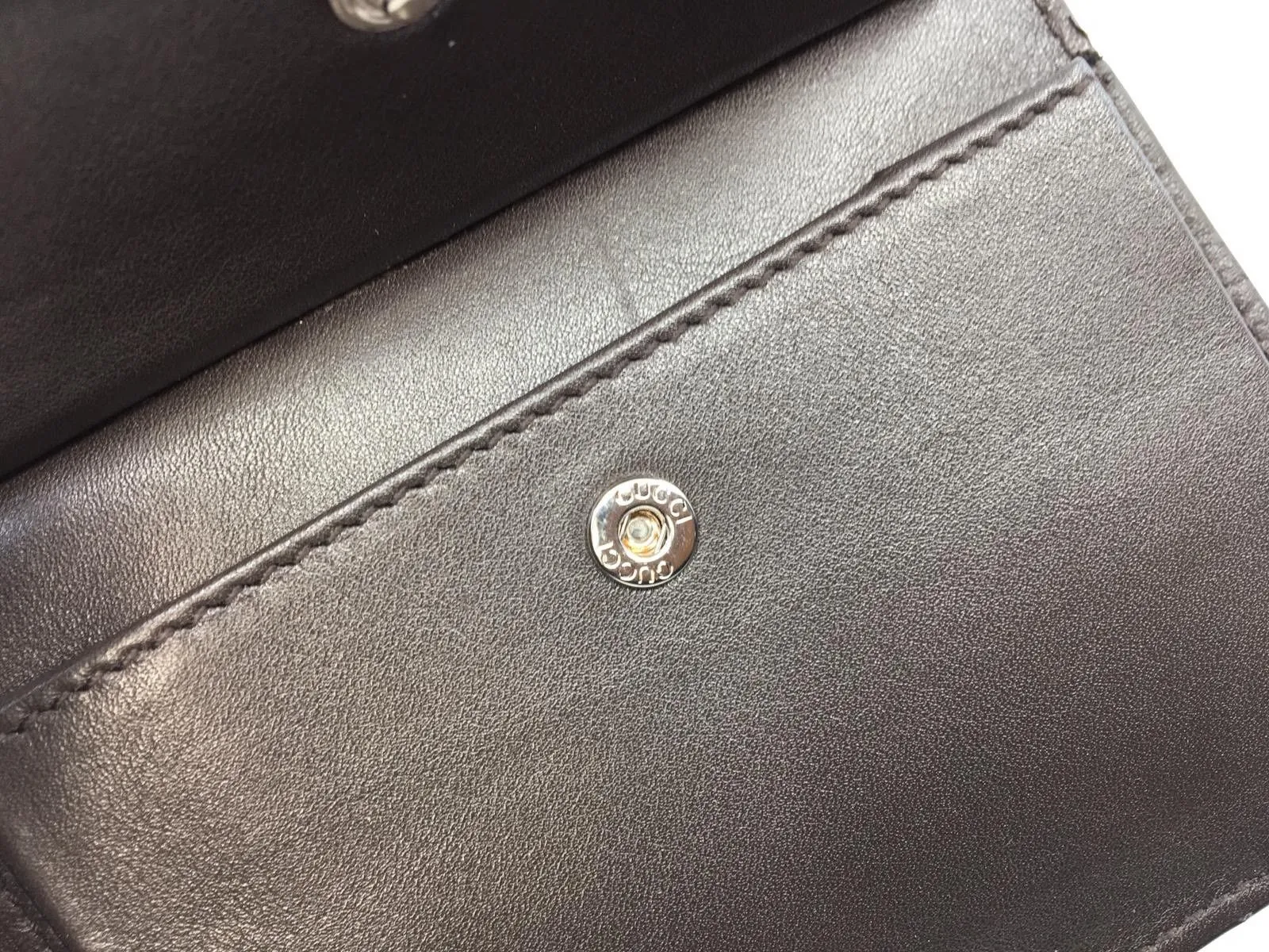 Gucci MicroGuccissima Bi-Fold Wallet