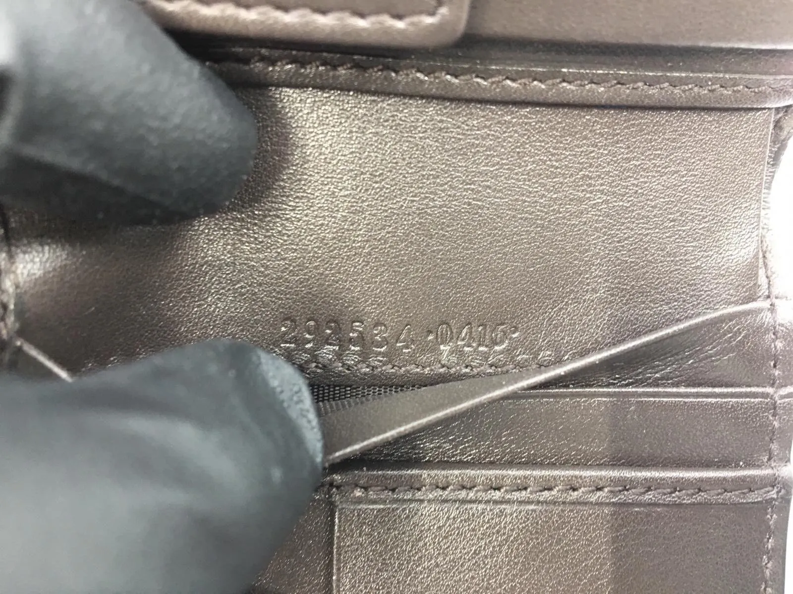 Gucci MicroGuccissima Bi-Fold Wallet
