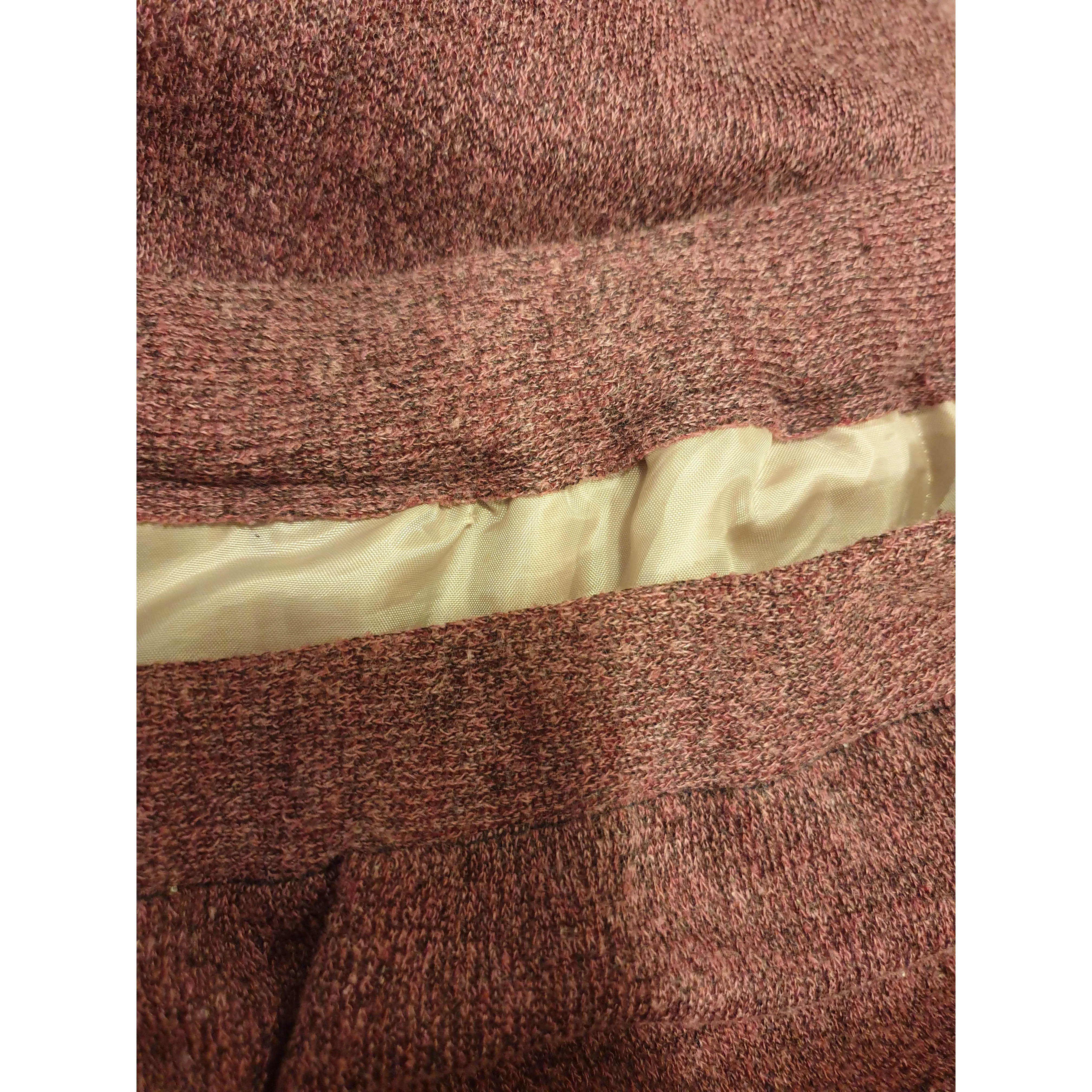 Pink knit skirt with full silky slip, elastic waist band best fits size 16