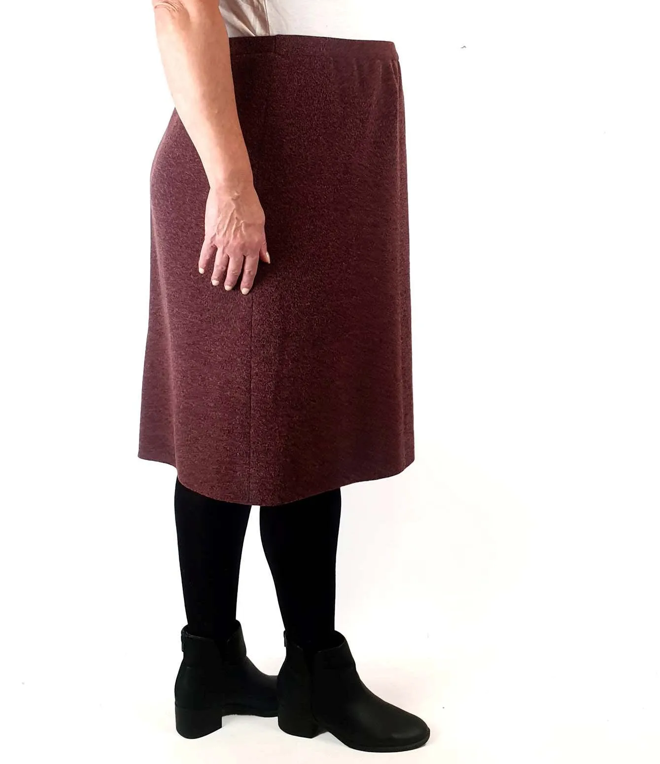 Pink knit skirt with full silky slip, elastic waist band best fits size 16