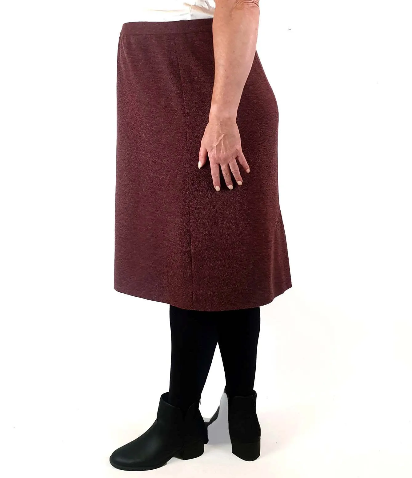 Pink knit skirt with full silky slip, elastic waist band best fits size 16
