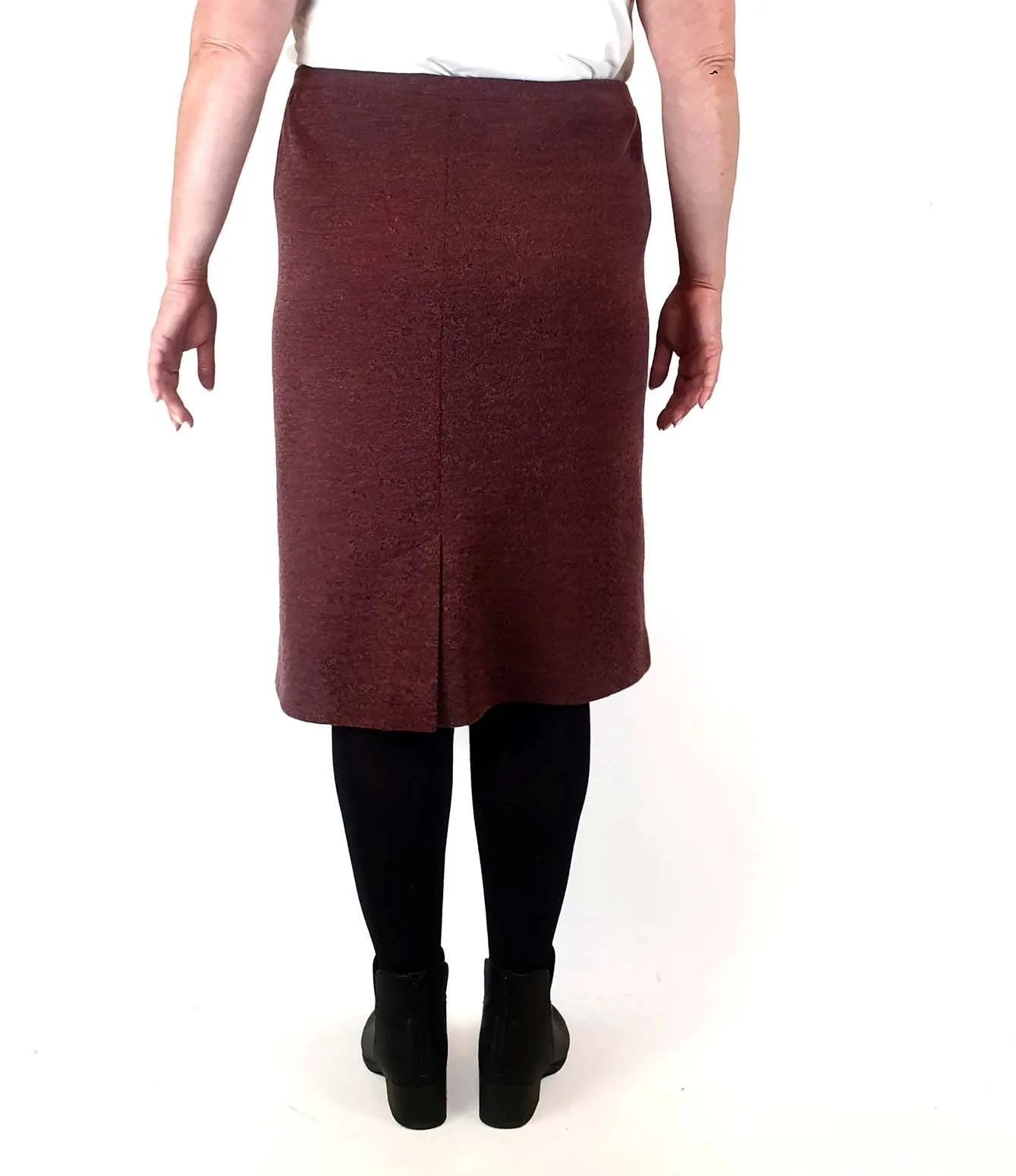 Pink knit skirt with full silky slip, elastic waist band best fits size 16